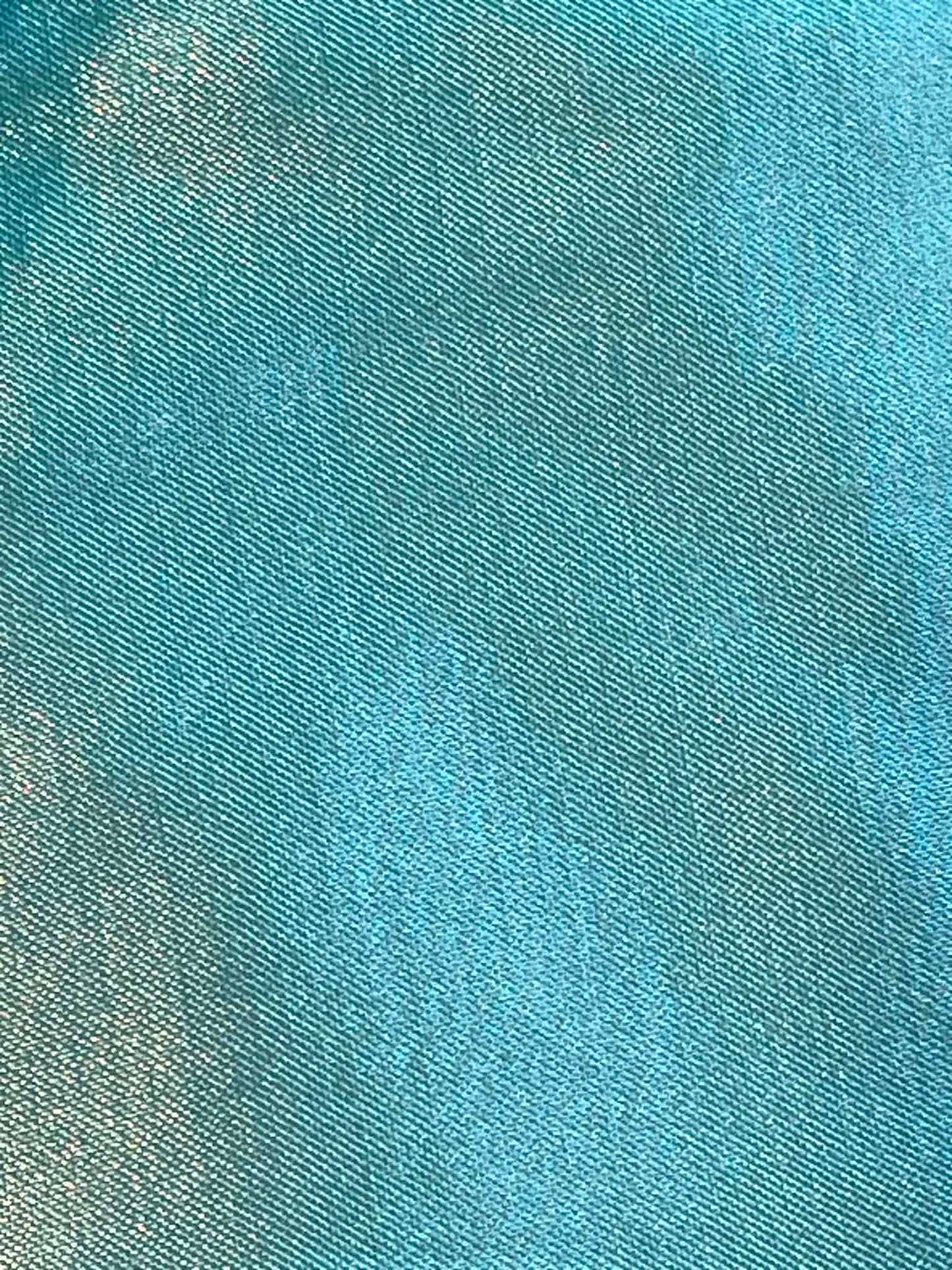 Aqua blue satin. Sold by the yard.