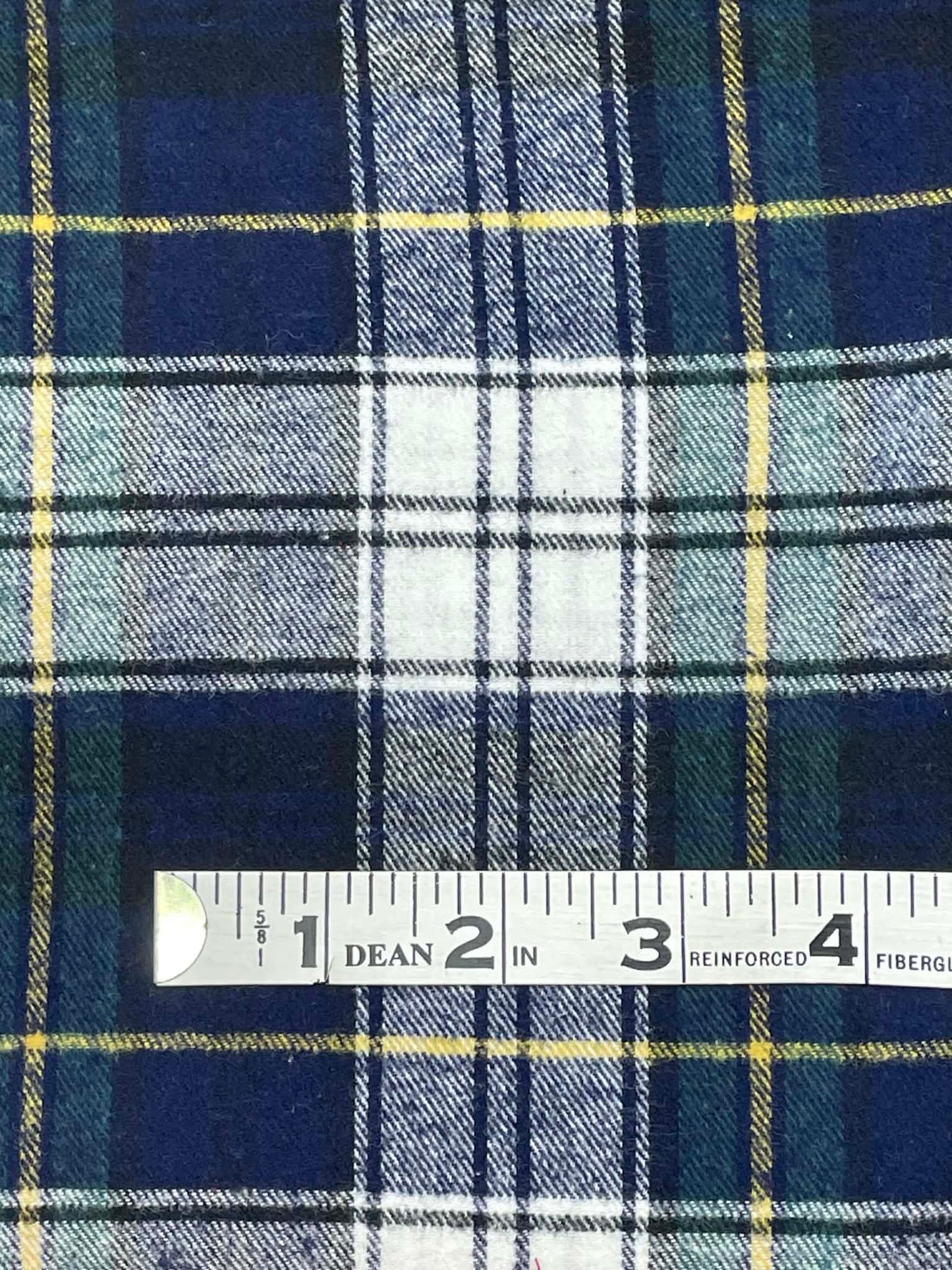 Ozark Mountain Flannel. Yarn dyed plaid. Blue, white and green. Sold by the yard.