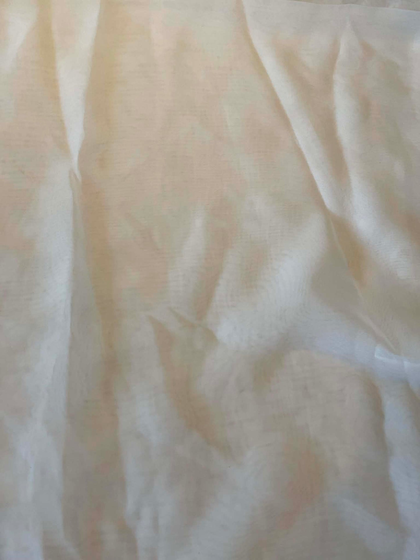 White chiffon. Sold by the yard.