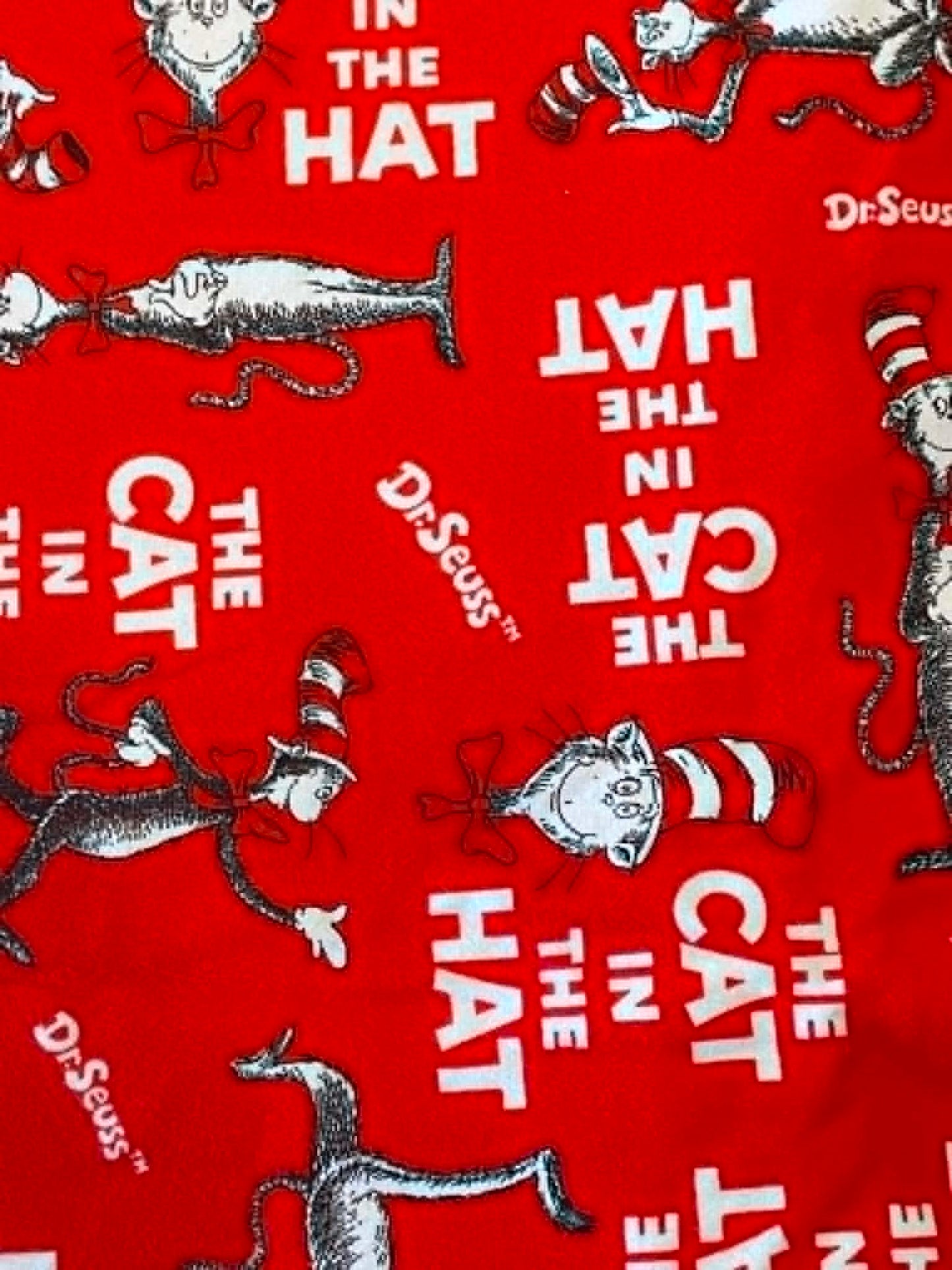 Flannel Cat In The Hat by Robert Kaufman. Sold by the half yard.