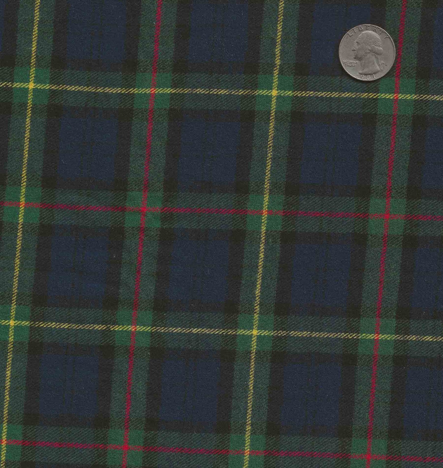 Blue and green plaid with small yellow and red stripes. Sold by the yard.