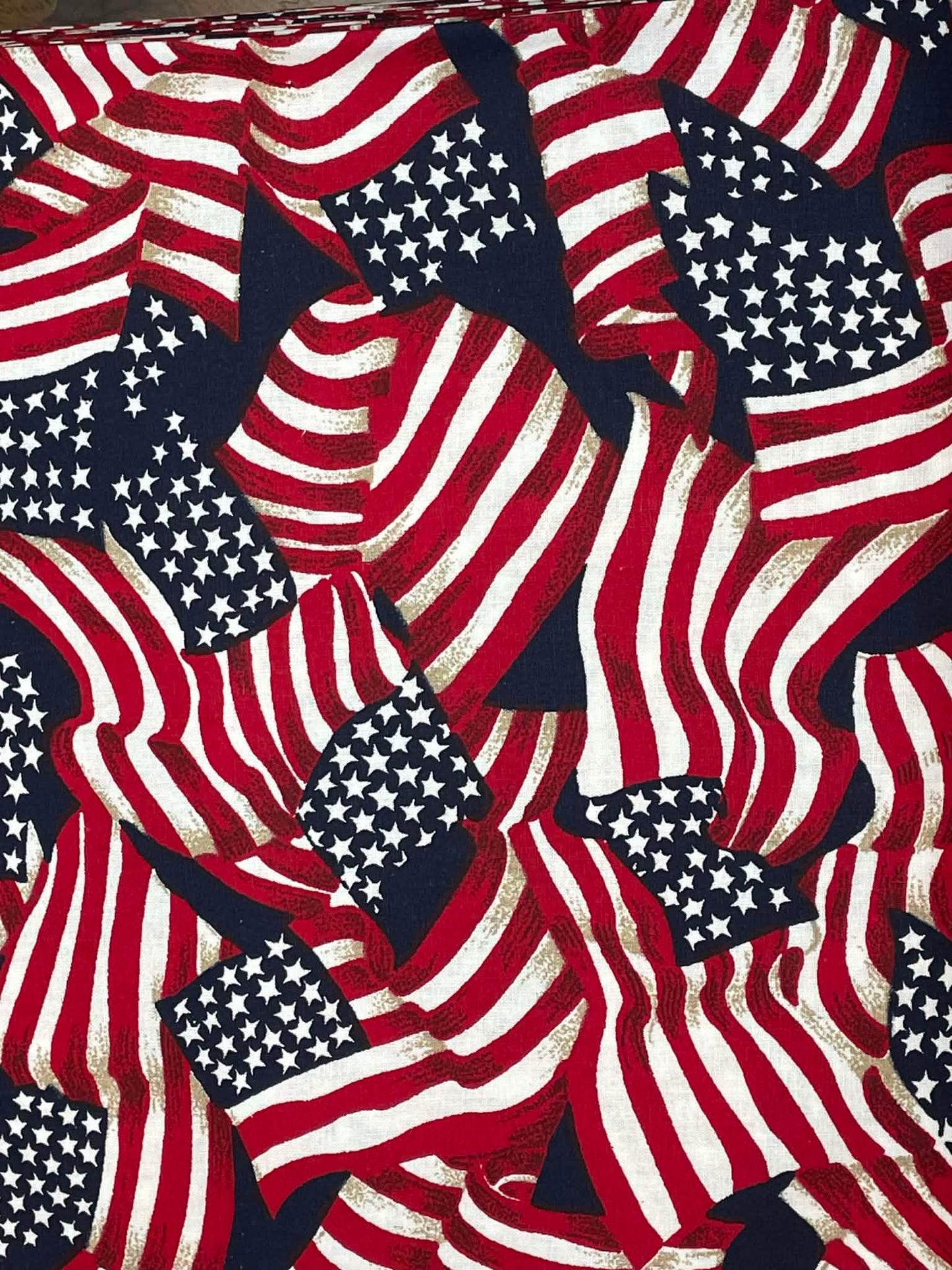 45" wide. Patriotic Flags. Sold by the yard.