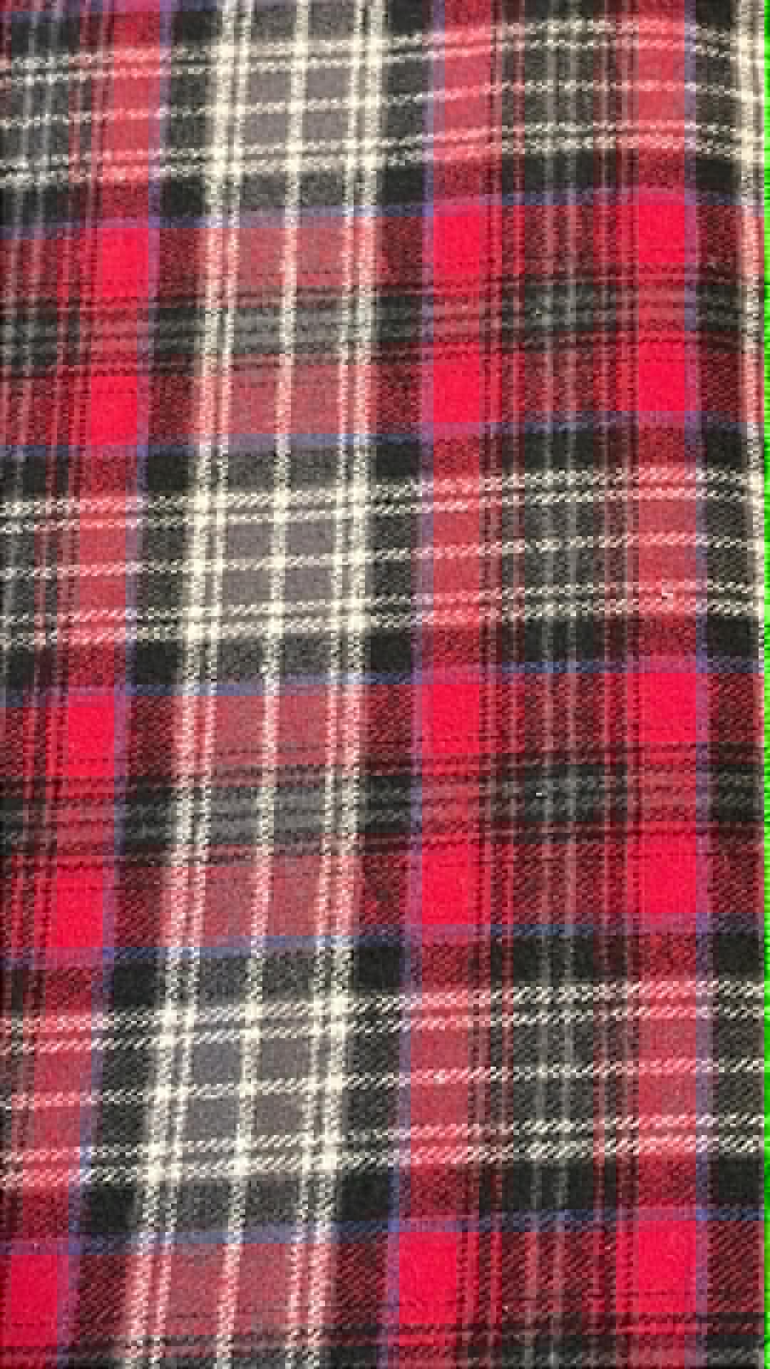 Ozark Mountain flannel. Dark red with black and white and small blue line. Sold by the yard.
