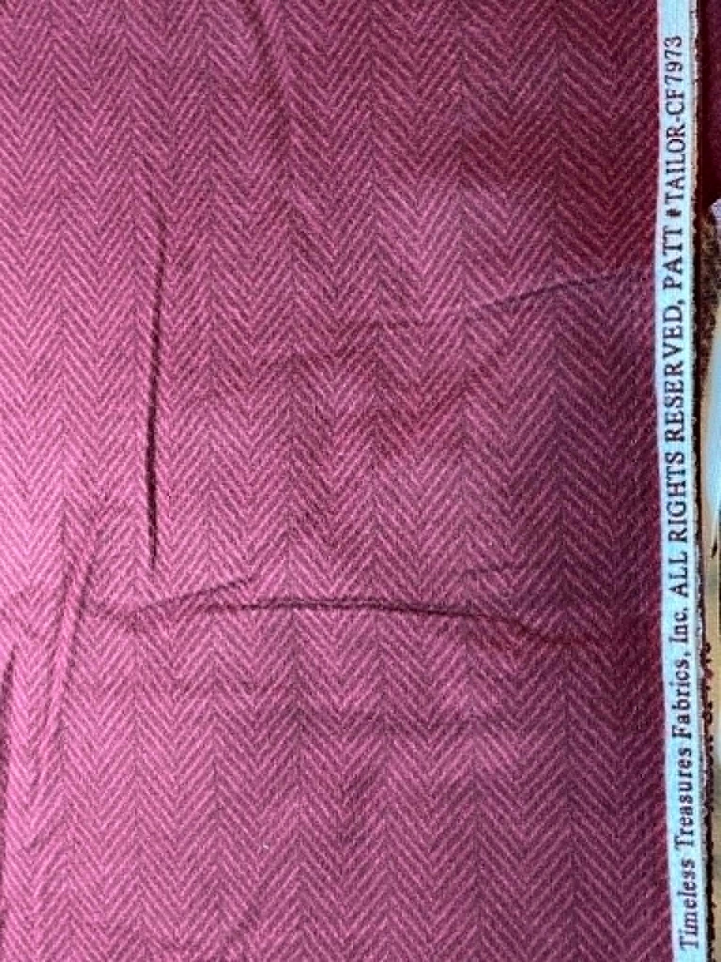 Flannel. Burgundy Herringbone. Sold by the half yard.