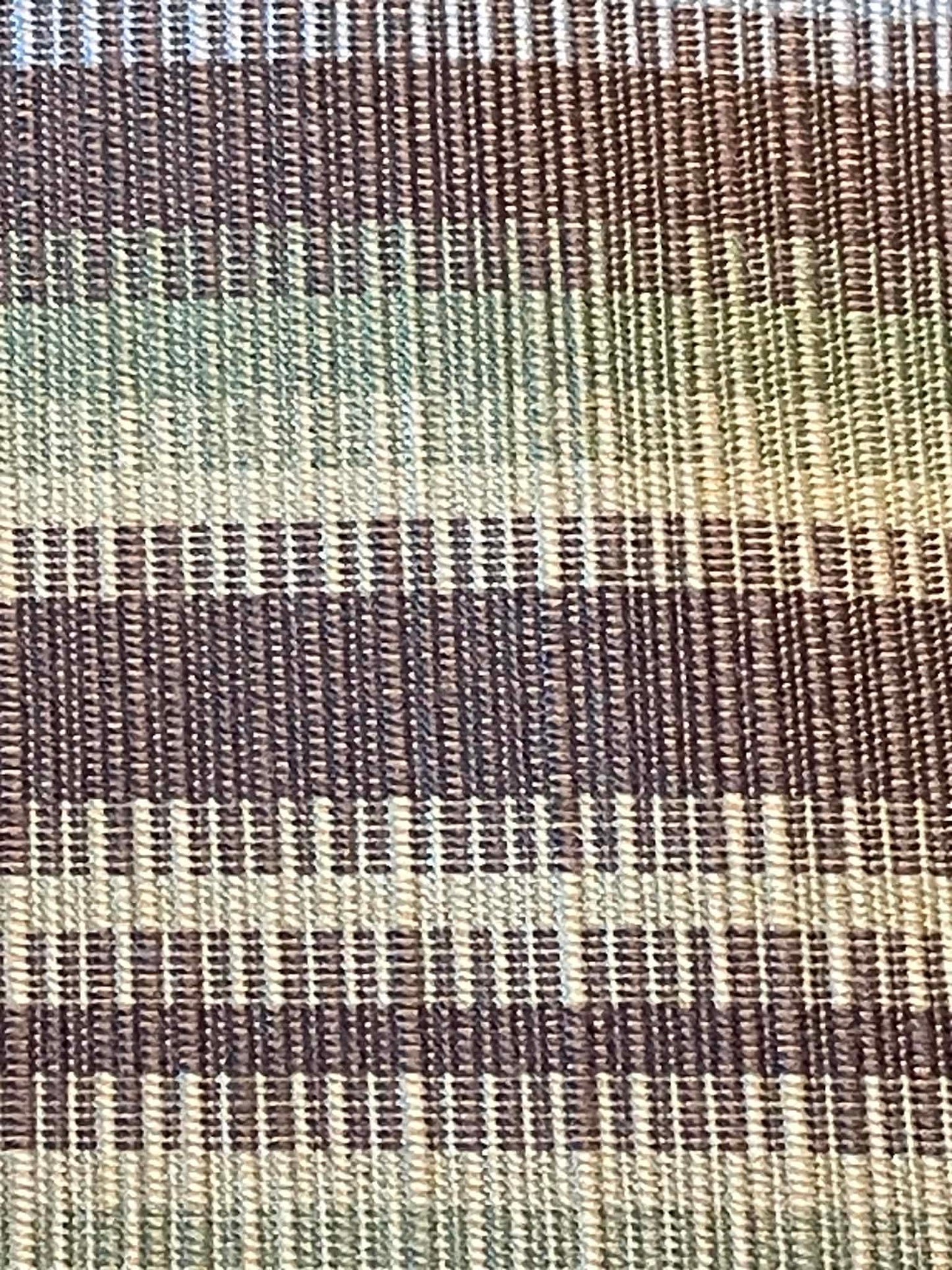 Green, blue and brown stripes. Heavy upholstery fabric. Sold by the yard.