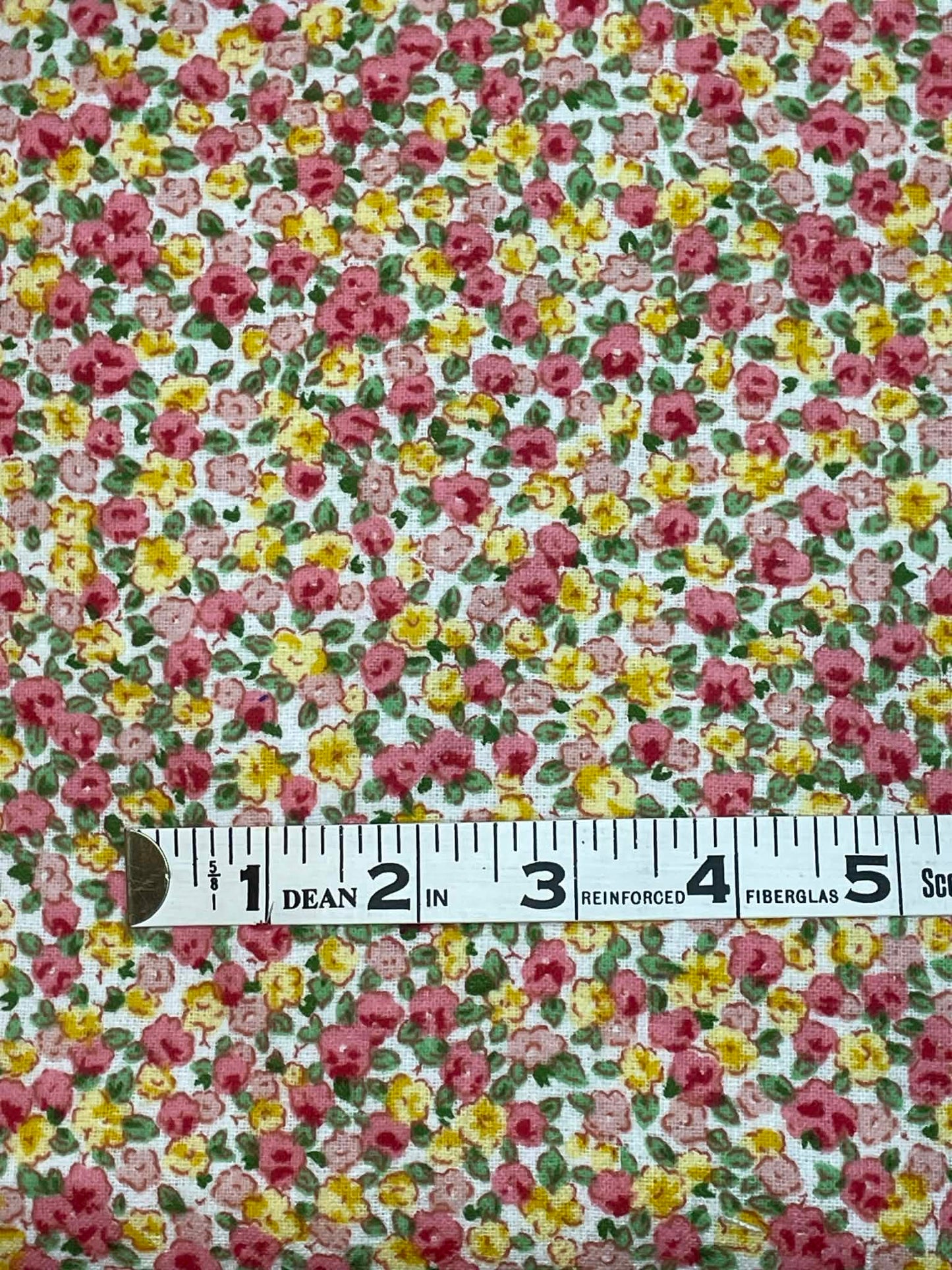 Flannel print orange and yellow flowers. Sold by the yard.