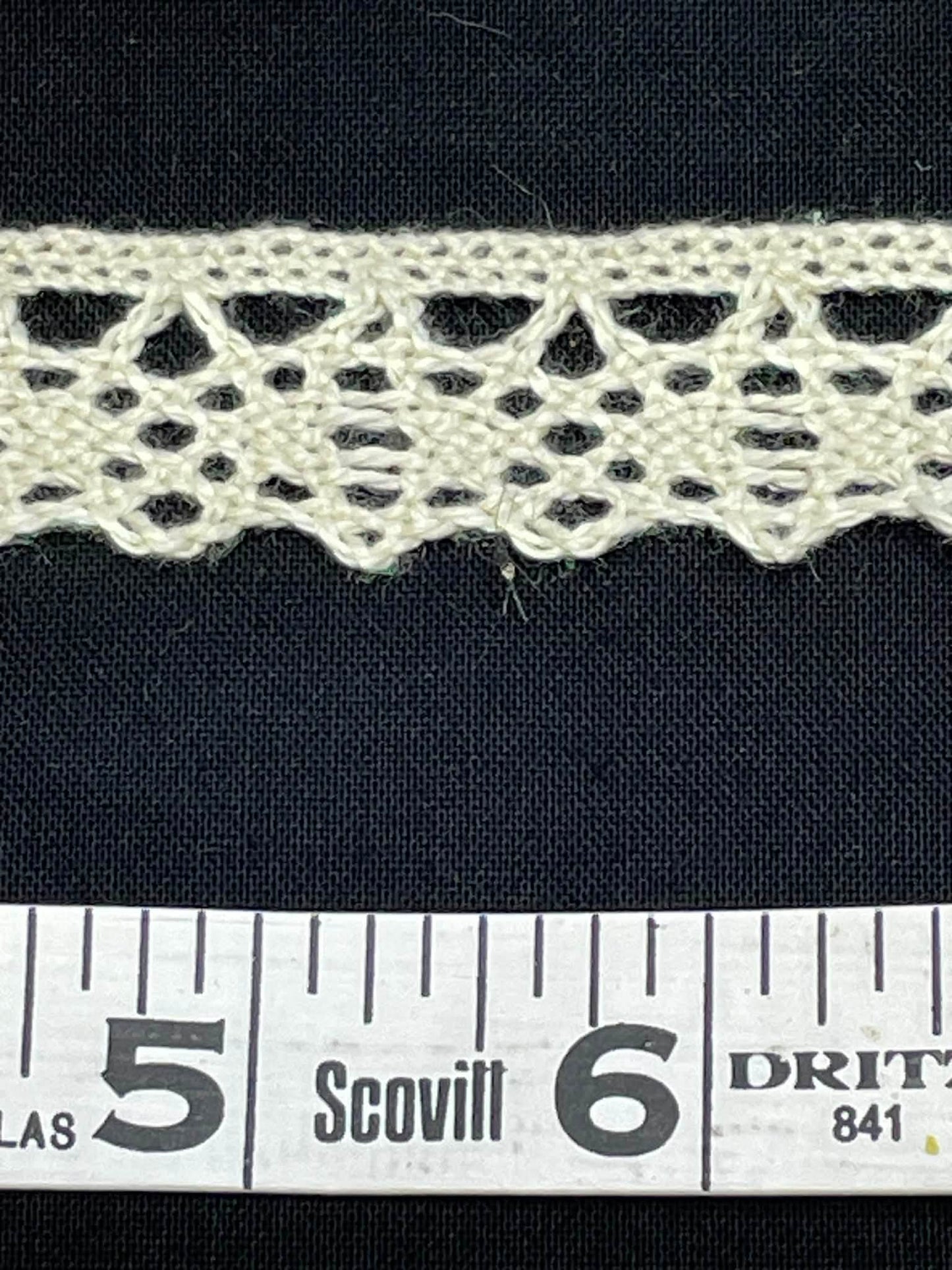3/4" wide natural cotton cluny lace. Sold by the yard.