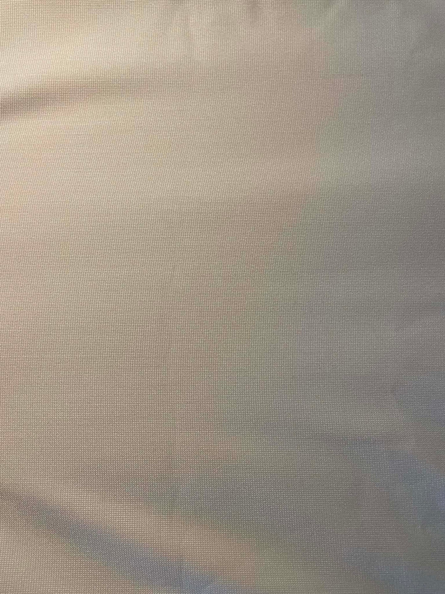 Cream colored medium weight apparel fabric