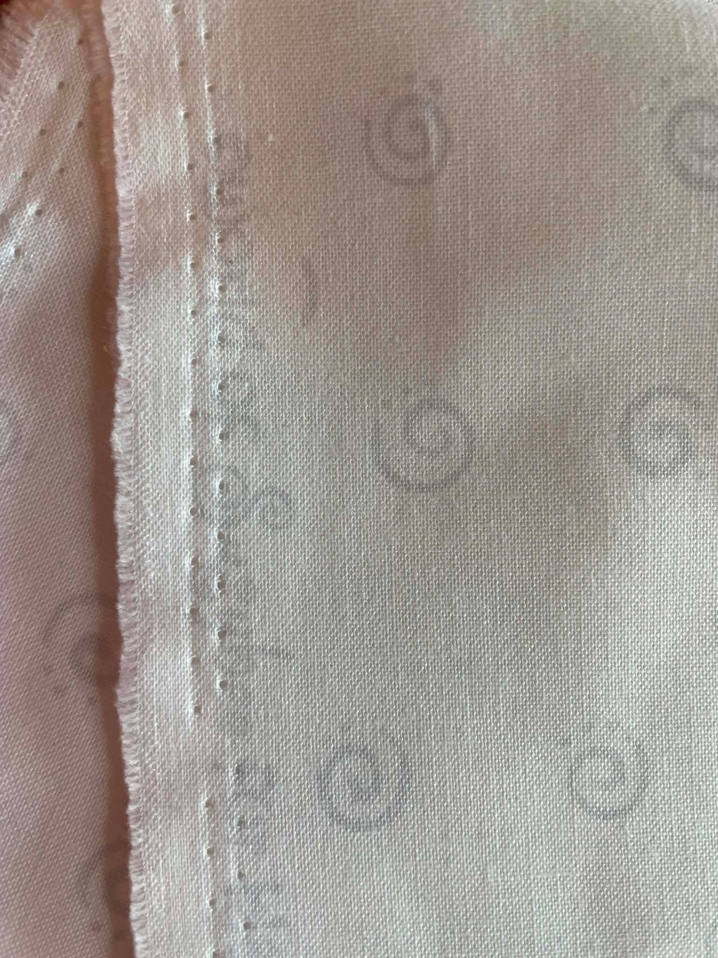 Gray Swirls on white. Sold by the yard.