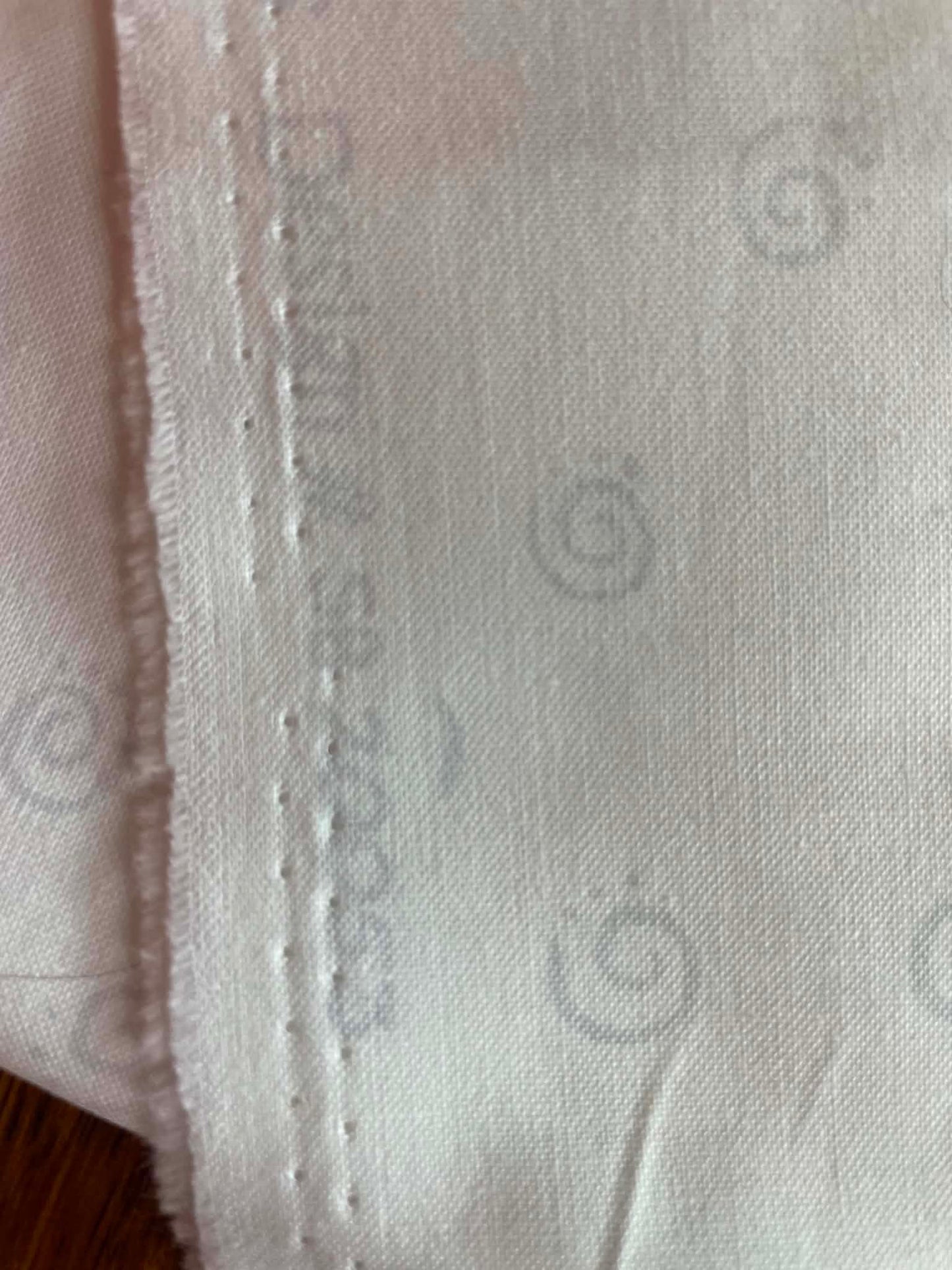 Gray Swirls on white.  Sold by the yard.