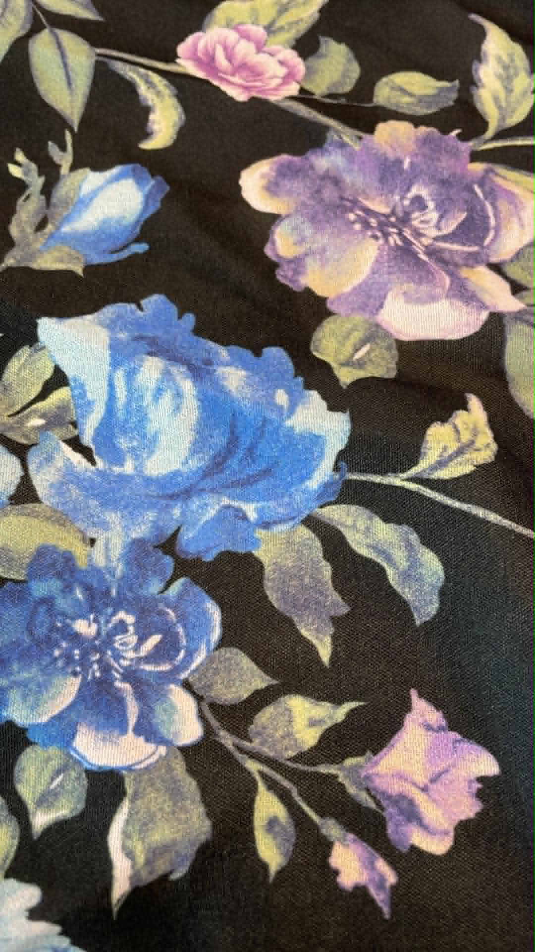 Blue and pink floral on black background.  ** REMNANT **