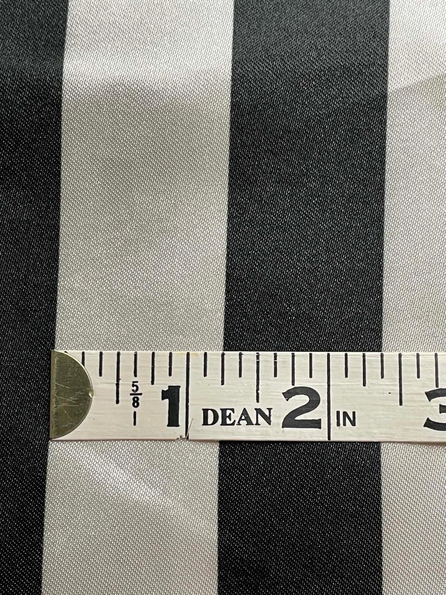 Black & white stripe satin.  Sold by the yard.