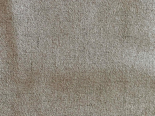 Grayish, off white upholstery fabric with white felt backing.  Sold by the half yard.
