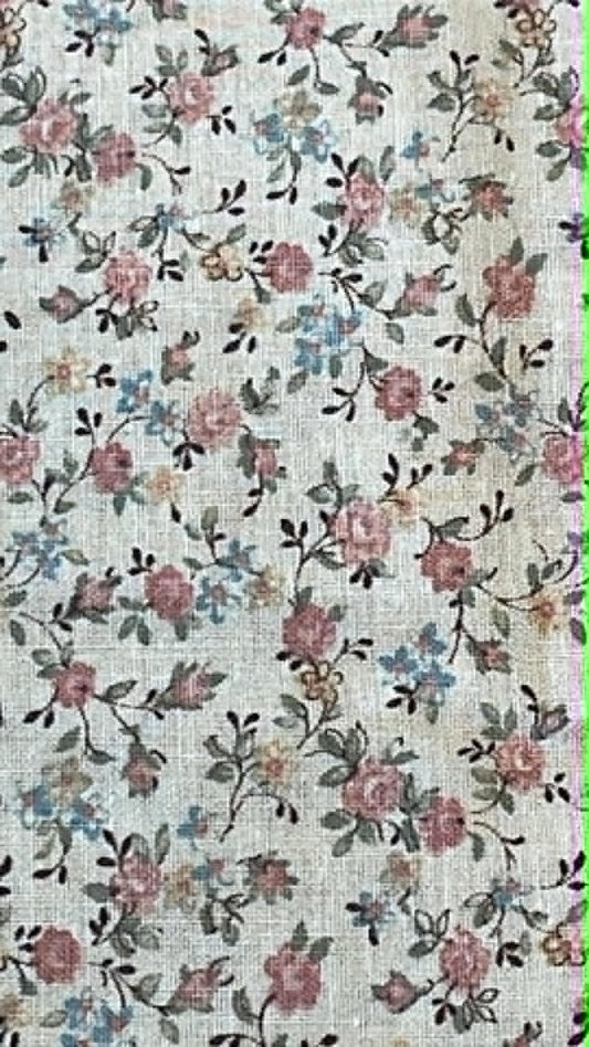 Tan ditsy floral.  Sold by the half yard.