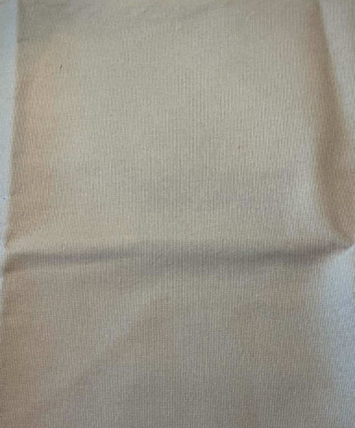 Khaki colored medium weight canvas.  Sold by the yard.