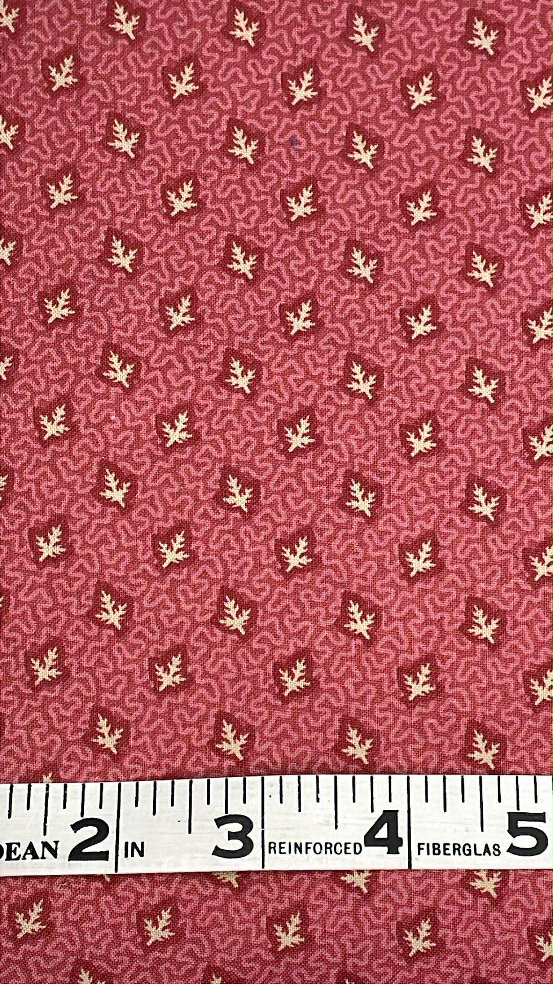 White leaves on pink background with squiggly lines