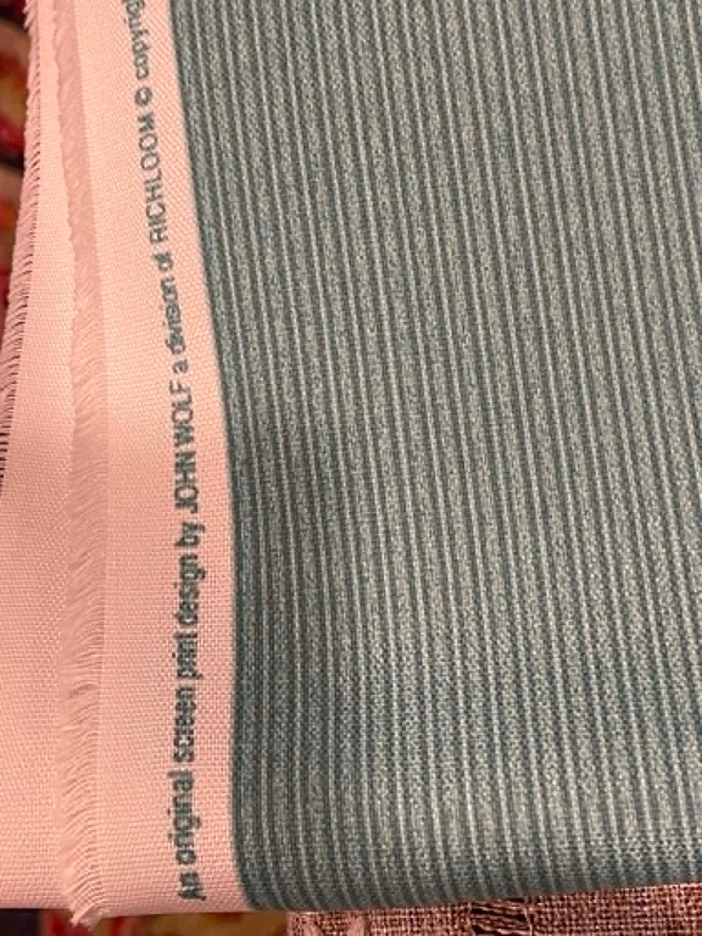 Green stripe upholstery fabric.  Sold by the yard