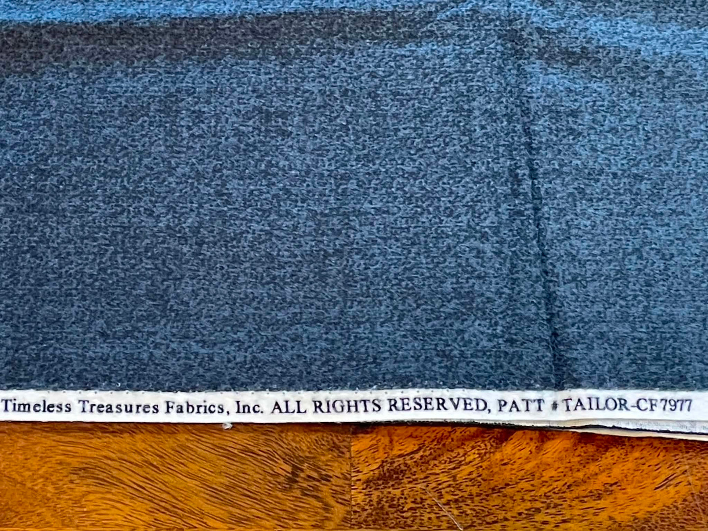 Flannel Dark Gray two toned.  Sold by the yard.