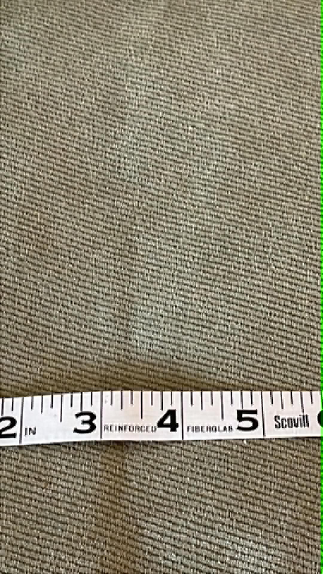 Pea green upholstery fabric with a twill weave and a corduroy feel.  Sold by the half yard.