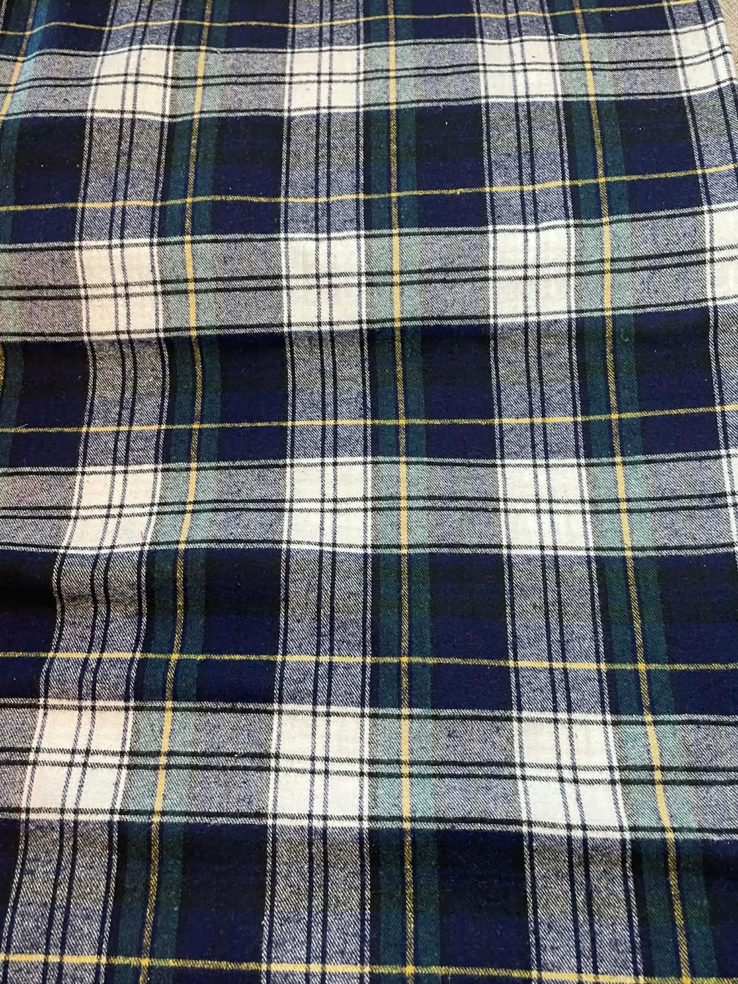 Ozark Mountain Flannel.  Yarn dyed plaid.  Blue, white and green.  Sold by the yard.