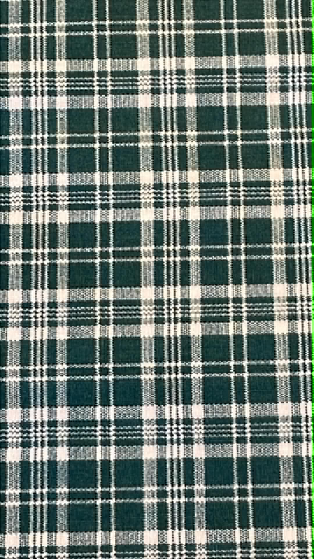 Hunter green and white plaid print.  Sold by the half yard.