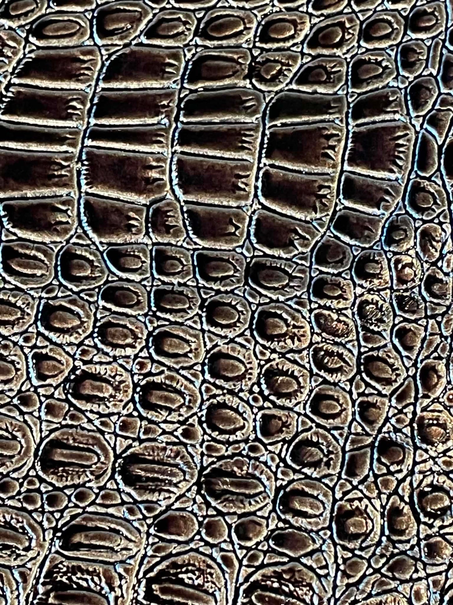 3 Remnants.  Crocodile embossed hide sheet material with black felt backing.