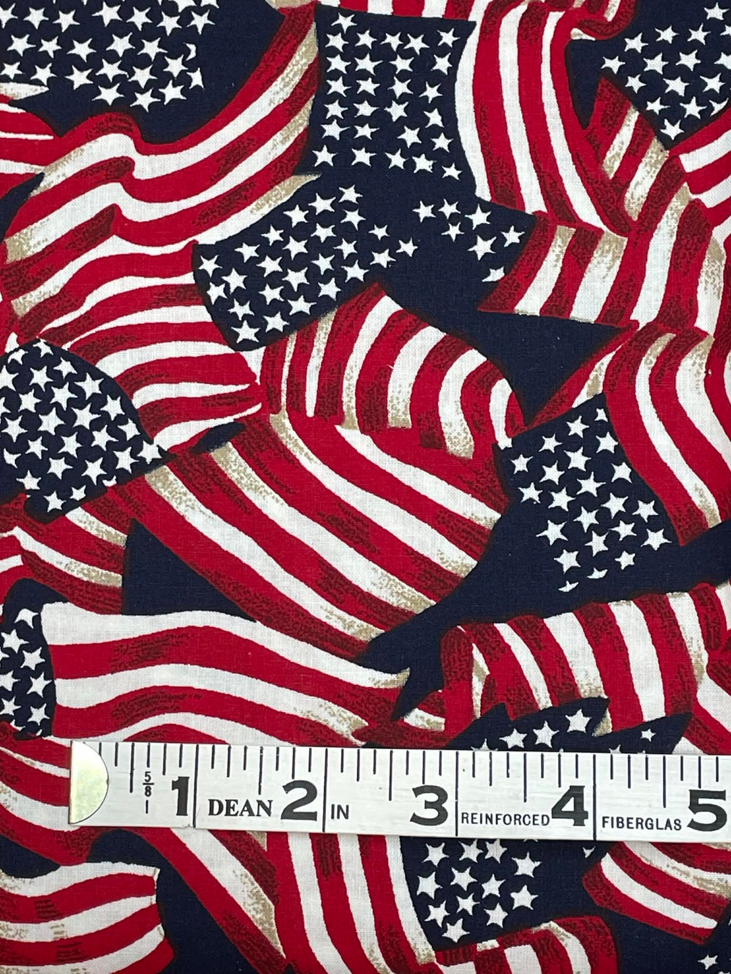 45" wide.  Patriotic Flags.  Sold by the yard.