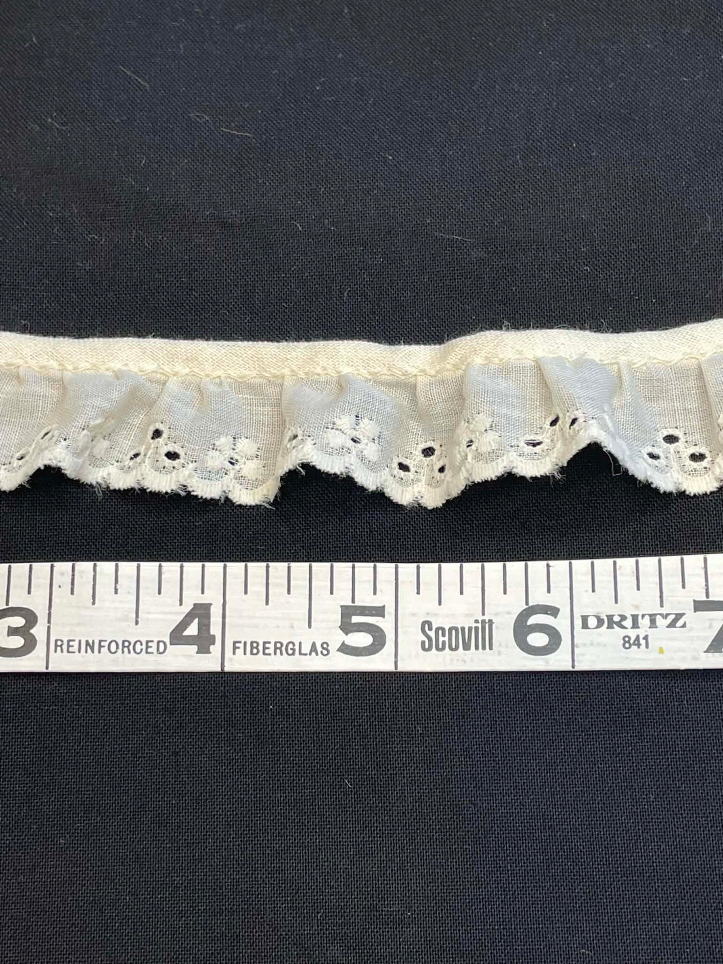 1" wide ruffled eyelet lace.  Sold by the yard.