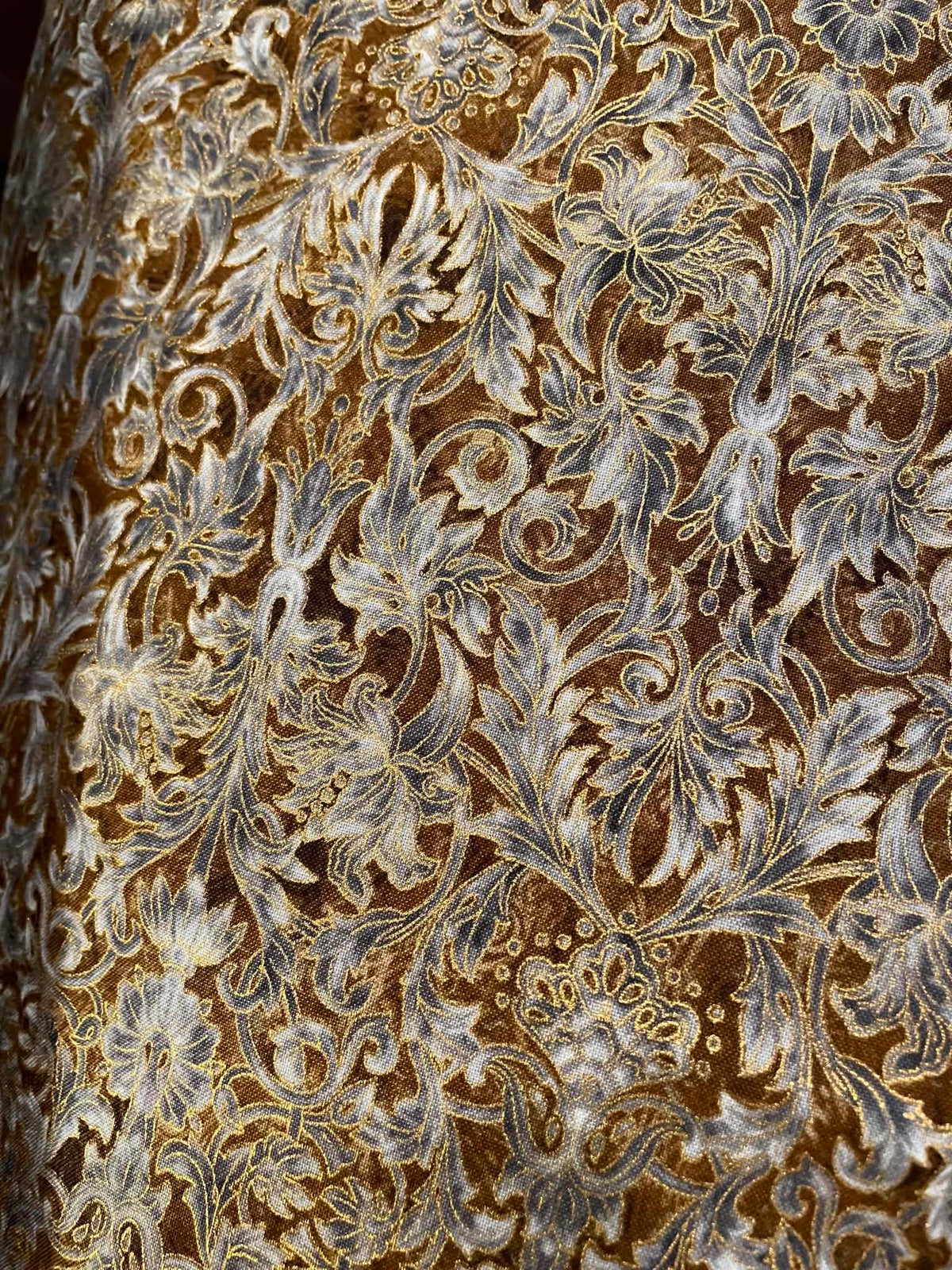 Robert Kaufman, La Scala 4, Brown and Rust with metallic gold.  Sold by the yard.