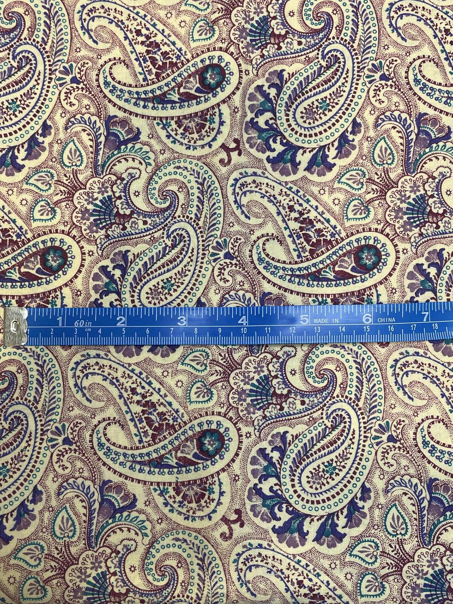 Maroon, teal and purple paisleys