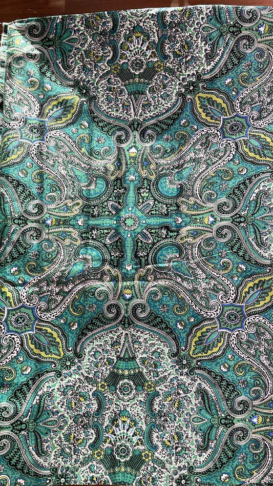 Mostly green, paisley like