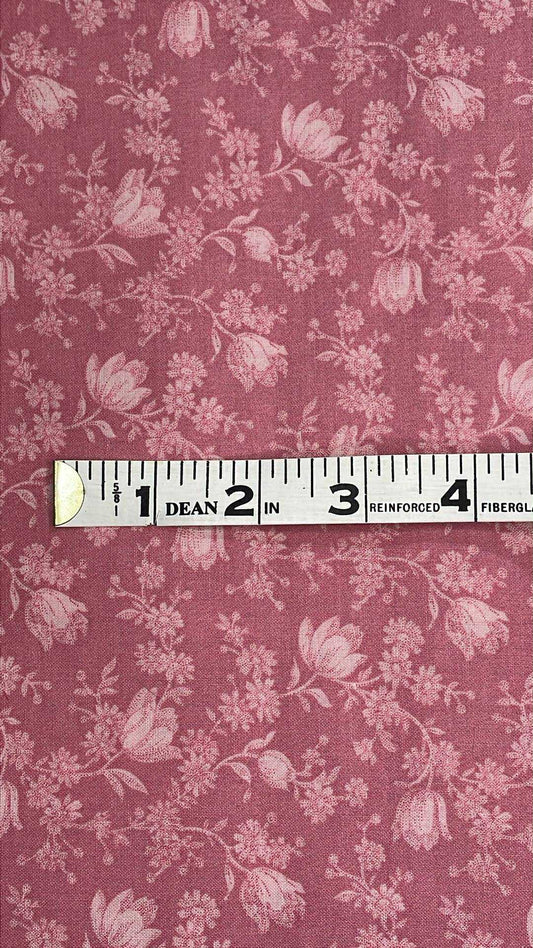 Light pink flowers on pink background