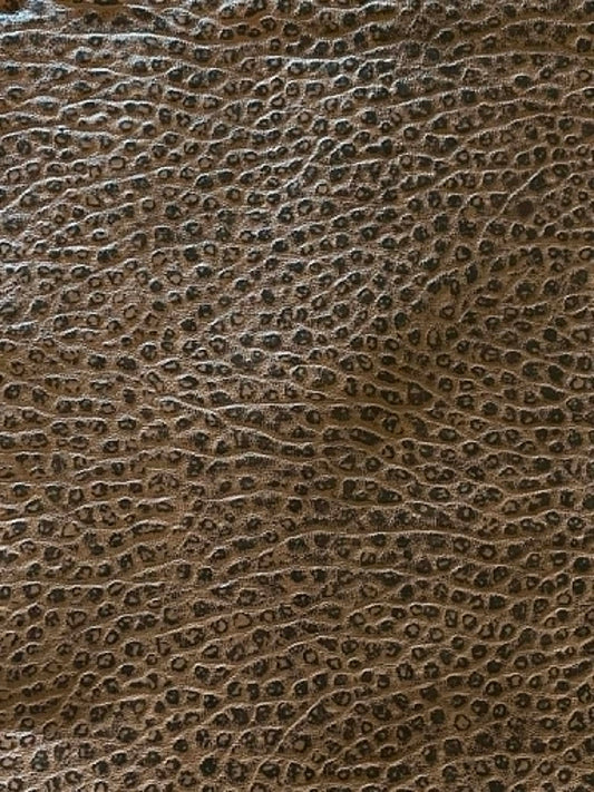 Remnant.  Black and brown embossed hide fabric.