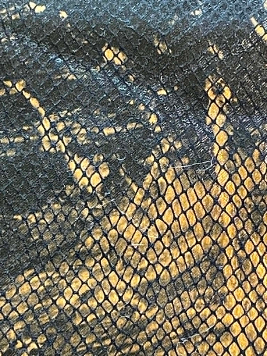 2 REMNANTS.  Copper and black embossed snake skin fabric.