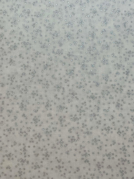 Timeless Treasures "First Frost" metallic silver.  Sold by the yard.