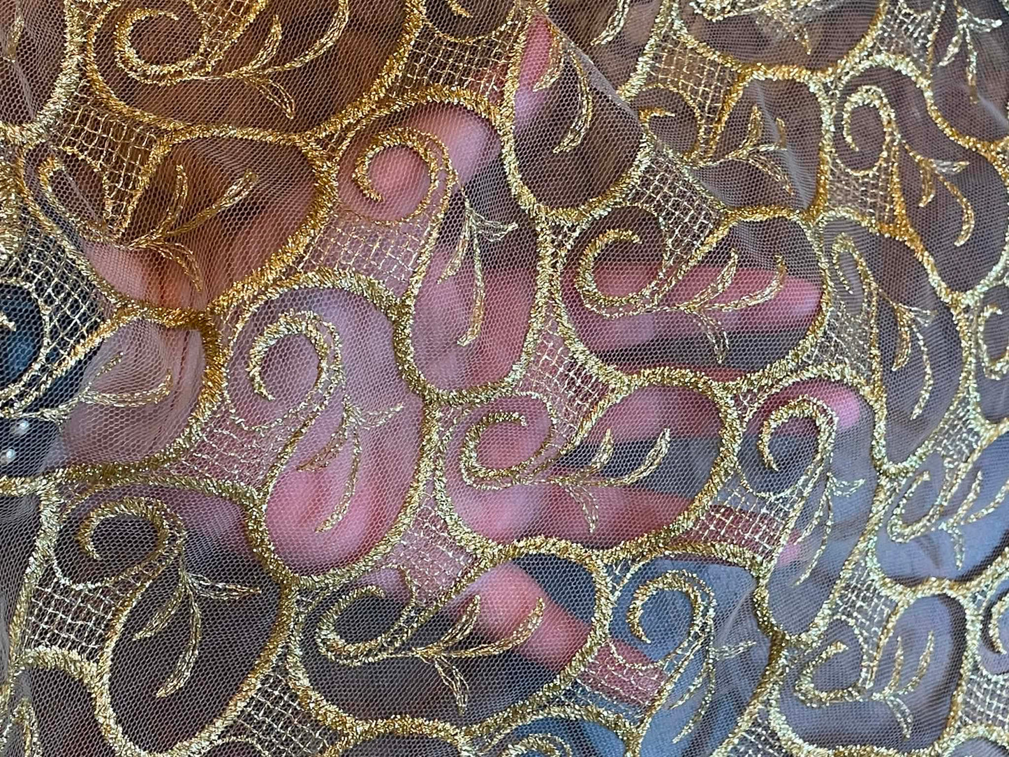 Metallic Gold All Over Lace.  Scalloped on both edges.  Sold by the yard.