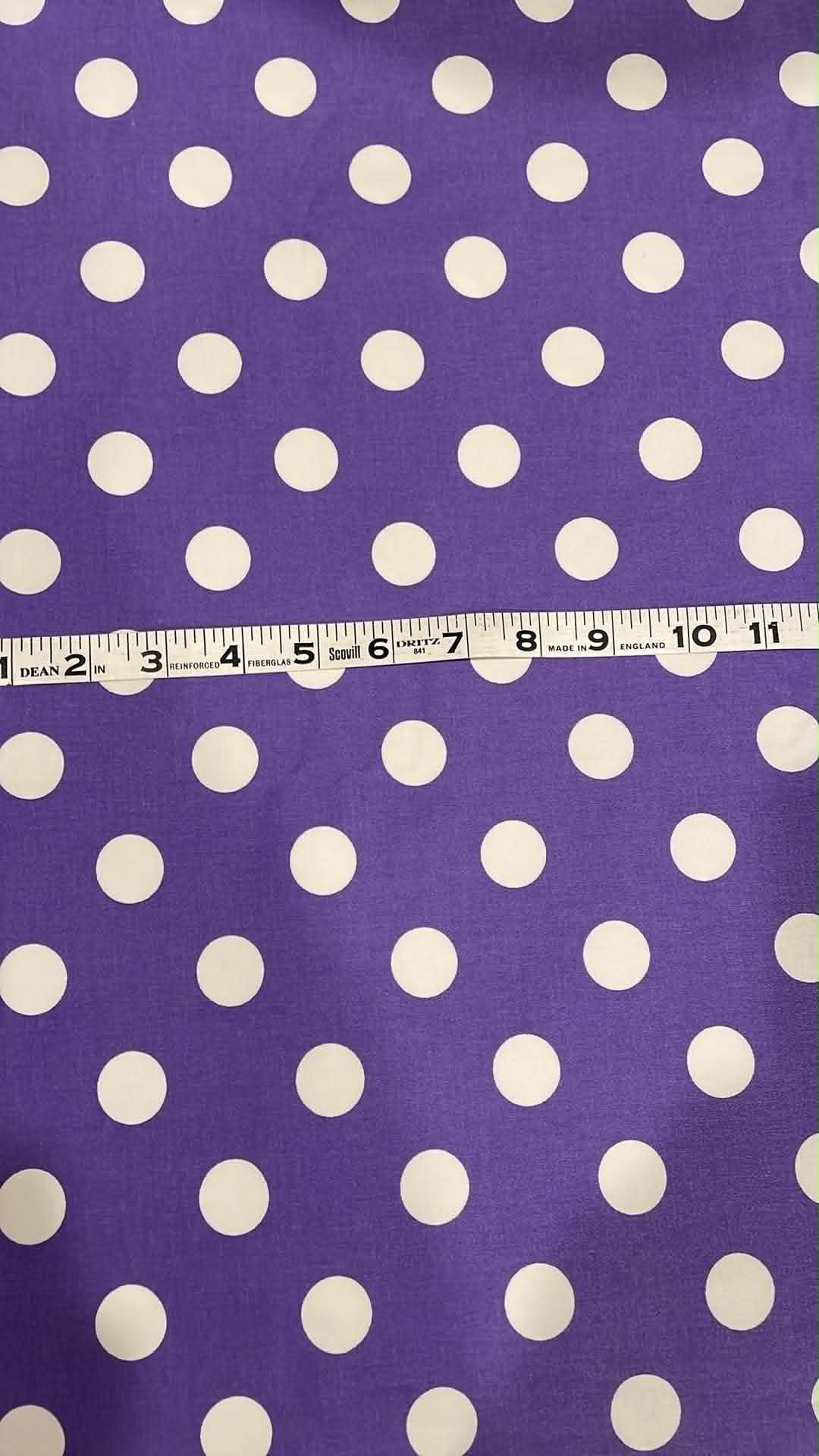 White polka dots on purple.  ** REMNANT **