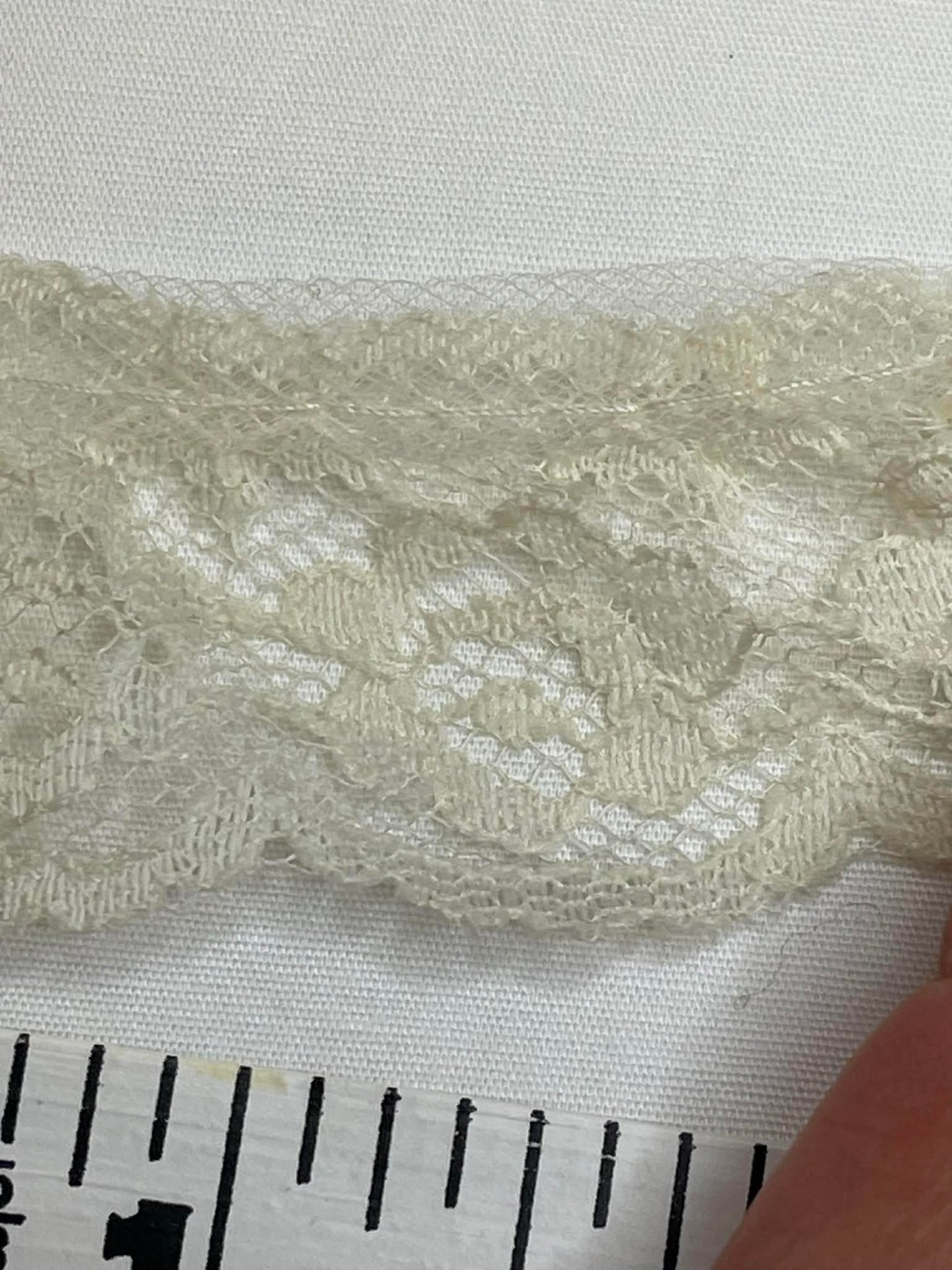 1" Wide Off White Trim.  Sold by the yard.