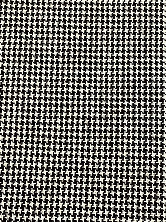 Black and white houndstooth.  Sold by the yard.