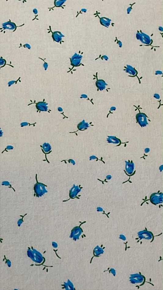 Ditsy floral.  Blue flowers on white.  Sold by the half yard.