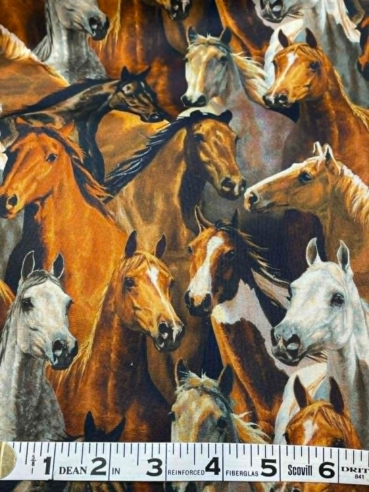 River's Bend Horse Heads, by Chris Cummings.  Sold by the half yard.