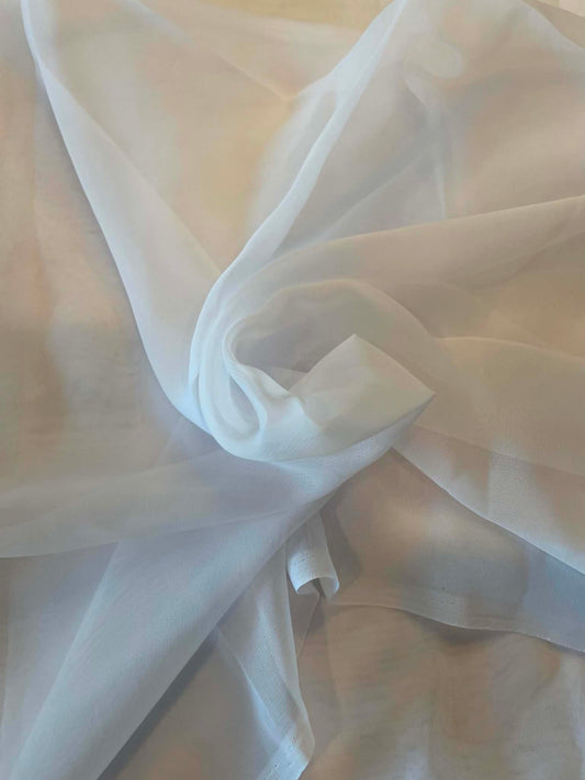 White chiffon.  Sold by the yard.