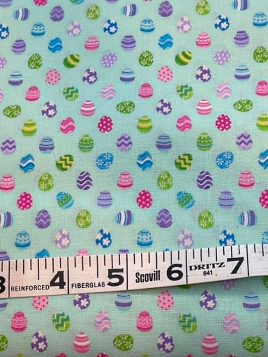 Spring Fling - Studio Cottons.  Patterned Easter Eggs on Turquoise.  Sold by the 1/2 yard.