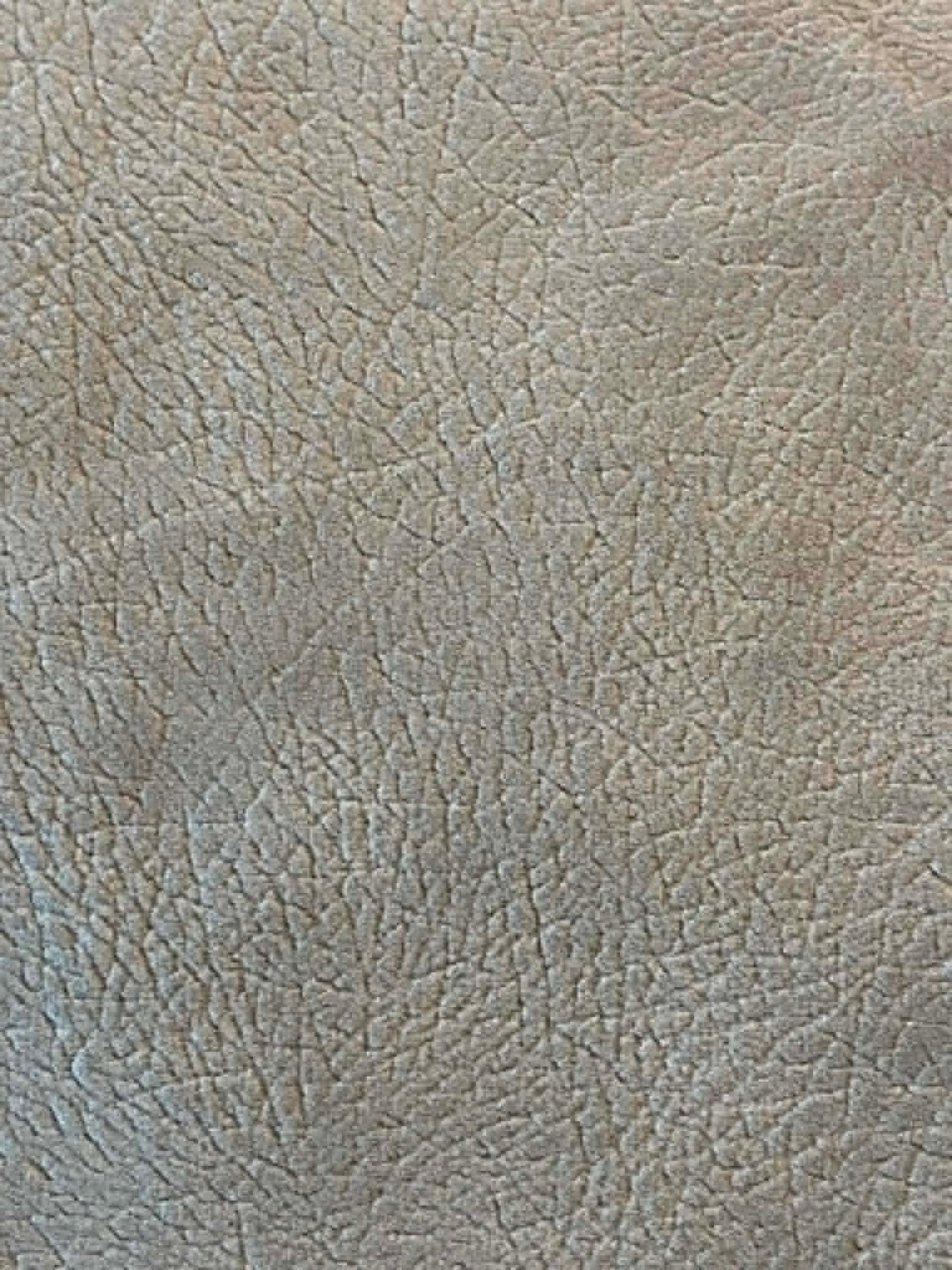 Tan faux suede.  54" wide.  Sold by the half yard.