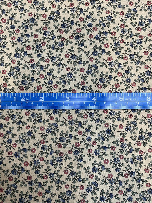 Small pink and blue flowers on beige