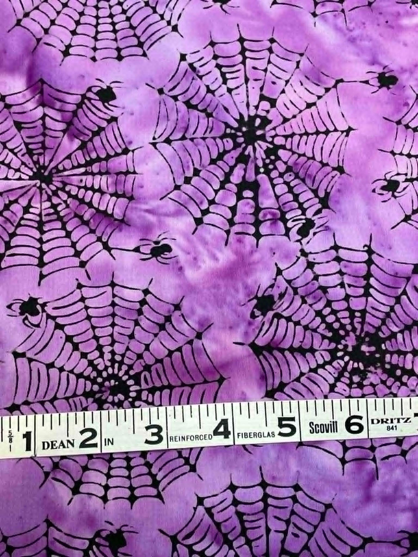 Island Batik - Spiders on Purple.  Sold by the half yard.