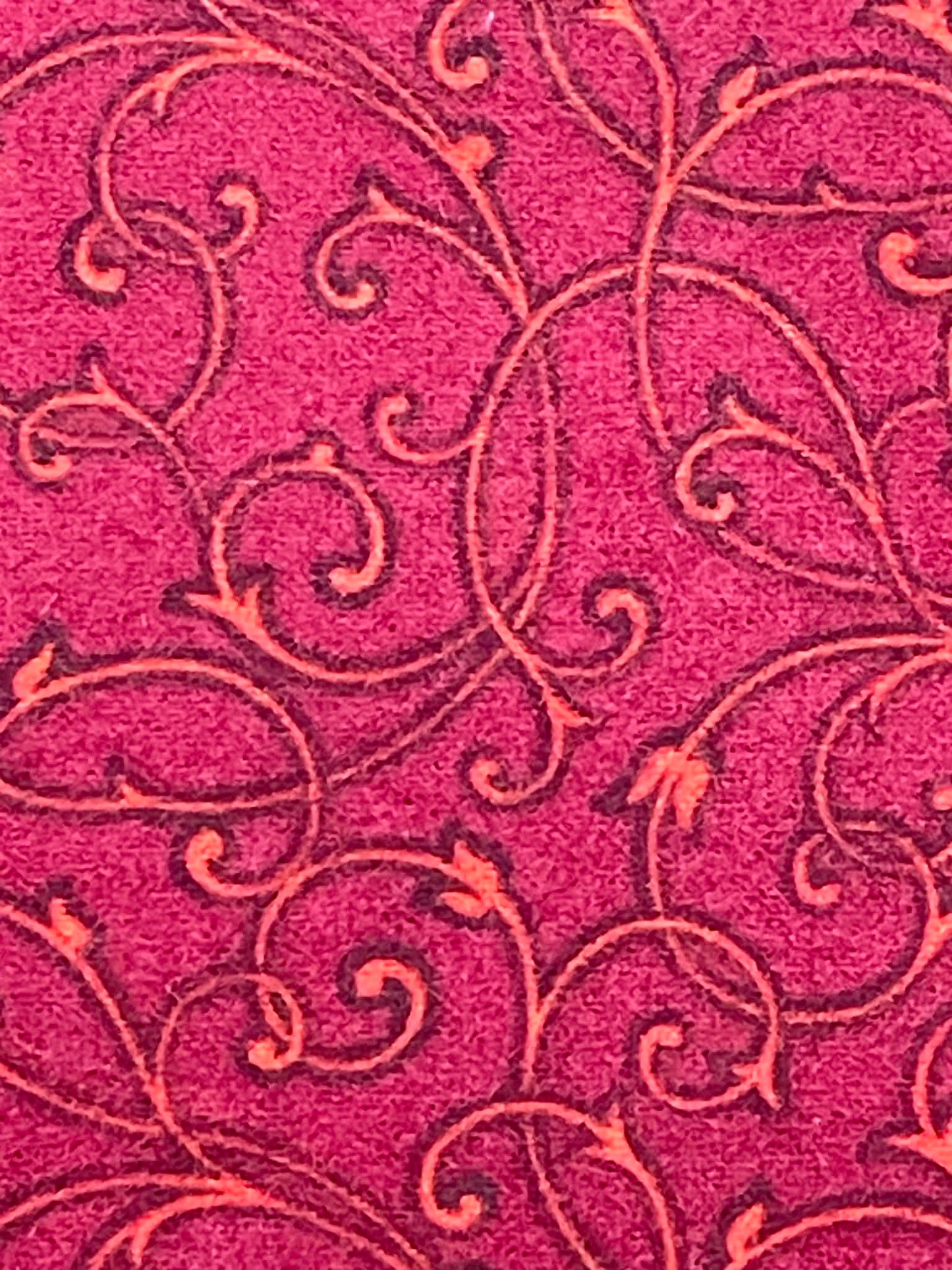 Flannel.  Deep red with swirls.  Sold by the yard.