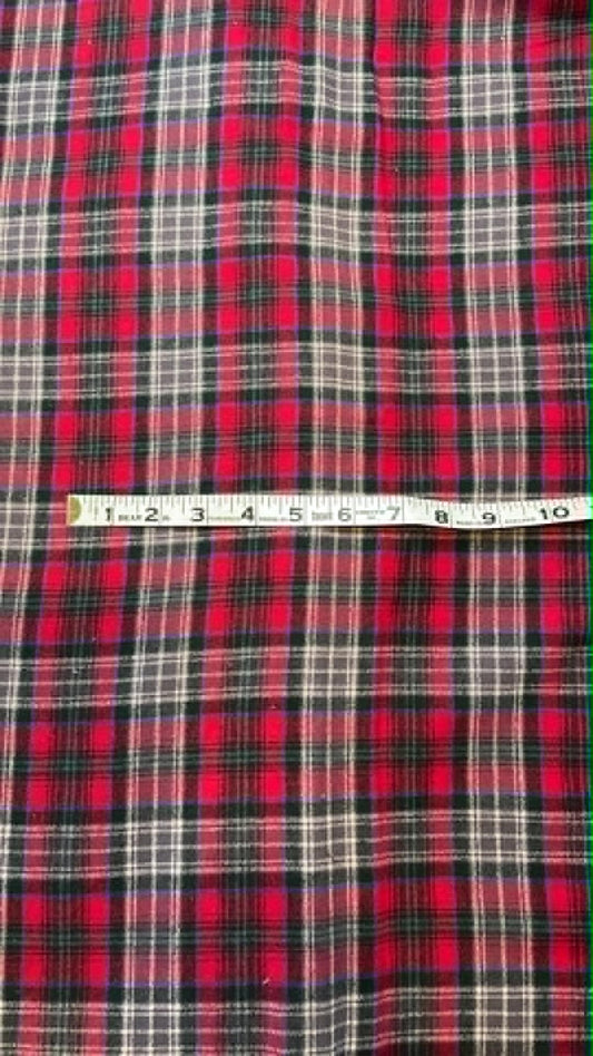 Ozark Mountain flannel.  Dark red with black and white and small blue line.  Sold by the yard.