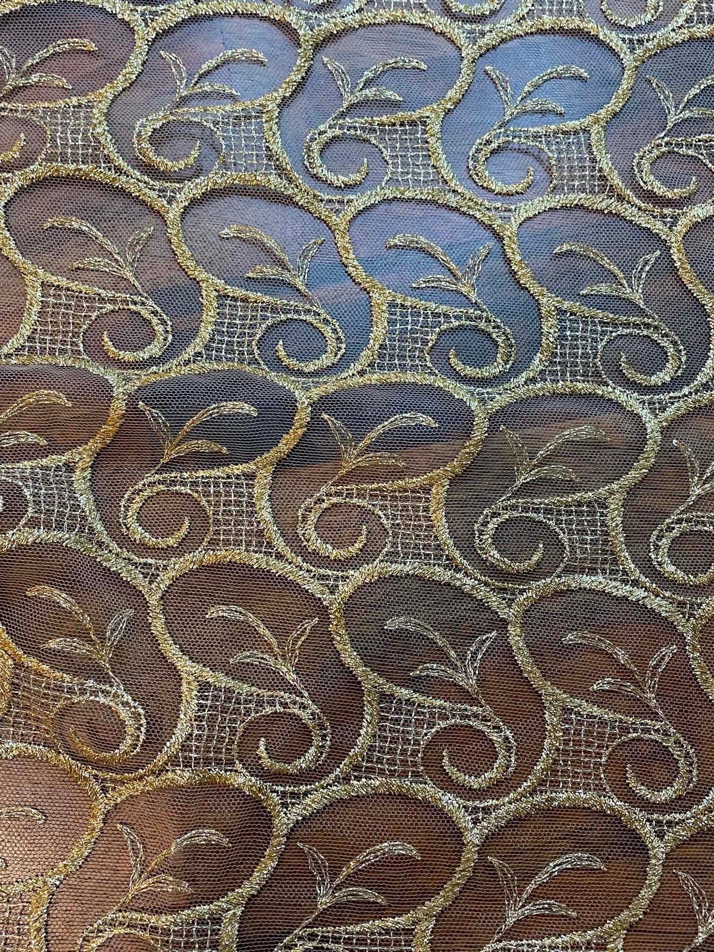 Metallic Gold All Over Lace.  Scalloped on both edges.  Sold by the yard.