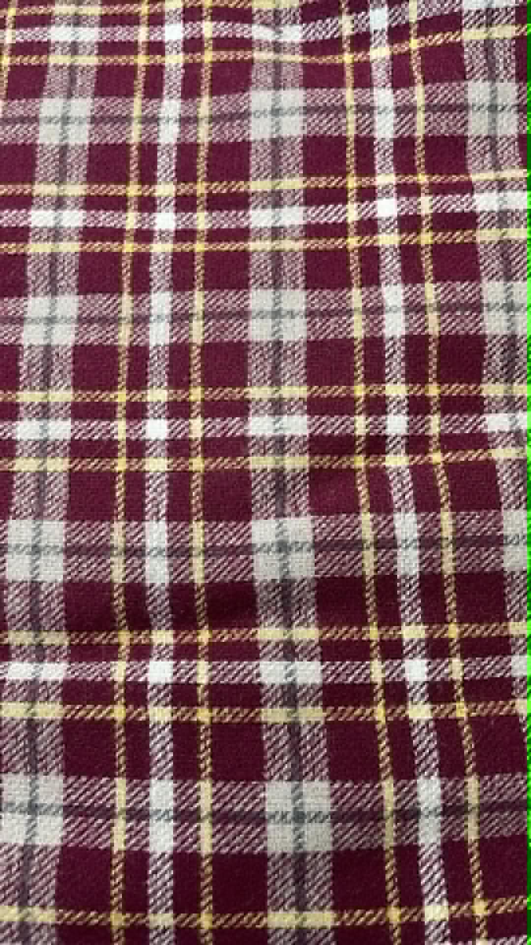 Ozark Mountain flannel.  Burgundy with white, gray and yellow.  Sold by the yard.